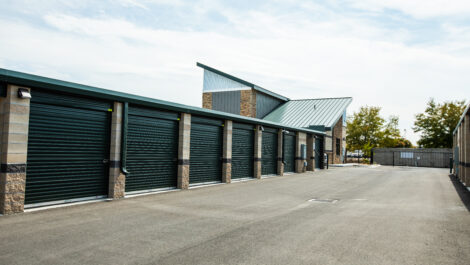 Row of outdoor storage units at the Towne Storage Colt Plaza Storage Facility