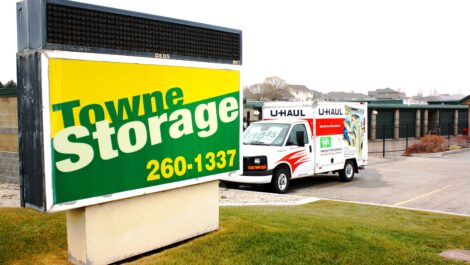 Main sign and uhaul truck outside the Towne Storage West Jordan Storage Facility