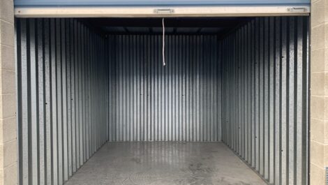 Storage unit with a rolled up door at the Towne Storage West Valley Storage Facility