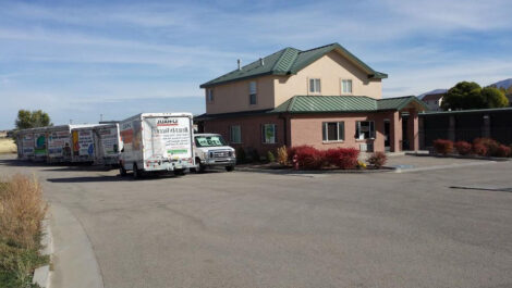 Uhaul trucks and main office at the Towne Storage West Jordan Storage Facility